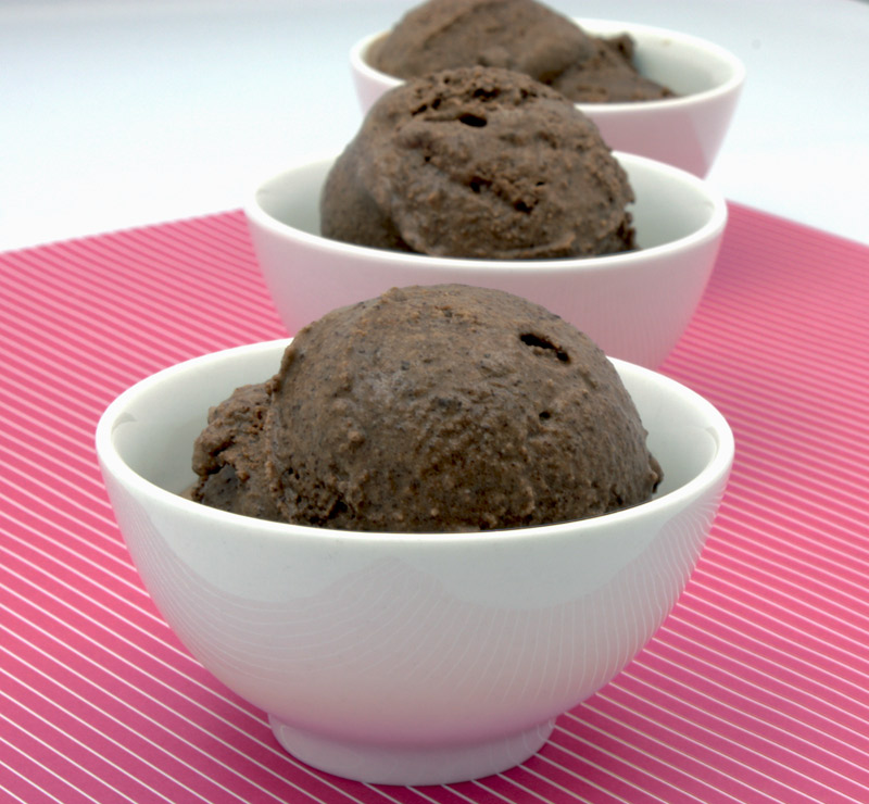 Ben & Jerry's Chocolate Ice Cream A photo of 3 white bowls of chocolate ice cream on a pink sheet of paper.