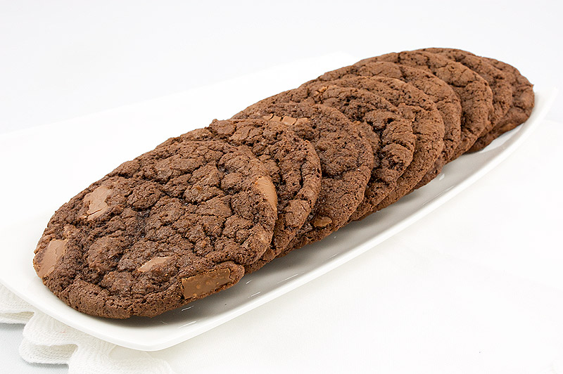 double-chocolate chunk cookie recipe, recipe for Martha Stewart's double chocolate cookies, easy recipe for double chocolate chunk cookies, delicious double-chocolate chunk cookies A photo of double-chocolate chunk cookies placed on a white dish.