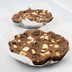 Robert Steinberg's absolute best brownies recipe, easy chocolate dessert recipes, easy brownie recipes A photo of 3 small skillet sized brownies lined with parchment.