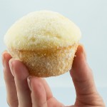 sugar donut muffin recipe, easy chocolate muffin recipe A photo of a person's hand holding a sugar donut muffin.