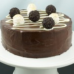 Ferrero Rocher White and Dark Chocolate Cake A photo taken looking down on a Ferrero Rocher White and Dark Chocolate Cake.