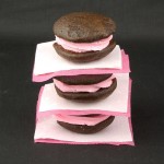 Chocolate Whoopie Pies with Vanilla Swiss Meringue Buttercream A photo of a stack of Chocolate Whoopie Pies with Vanilla Swiss Meringue Buttercream.