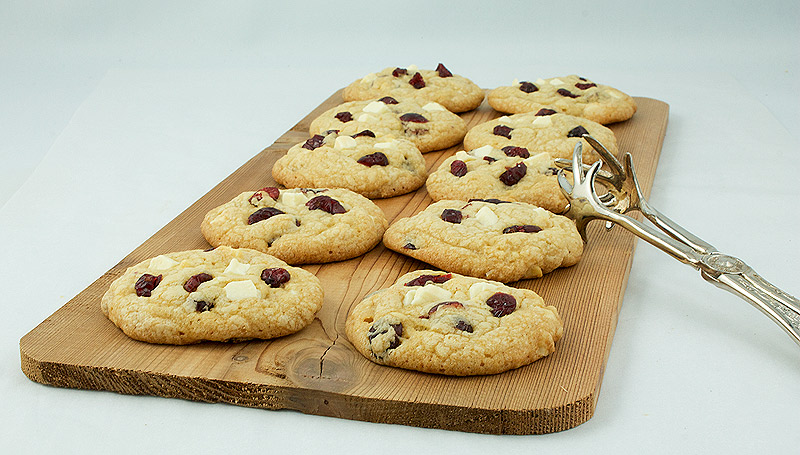 White Chocolate Cranberry Cookies A photo of White Chocolate Cranberry Cookies on a cedar plank.