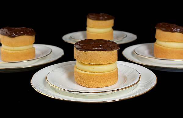 Boston Cream A photo of four Boston Cream desserts.