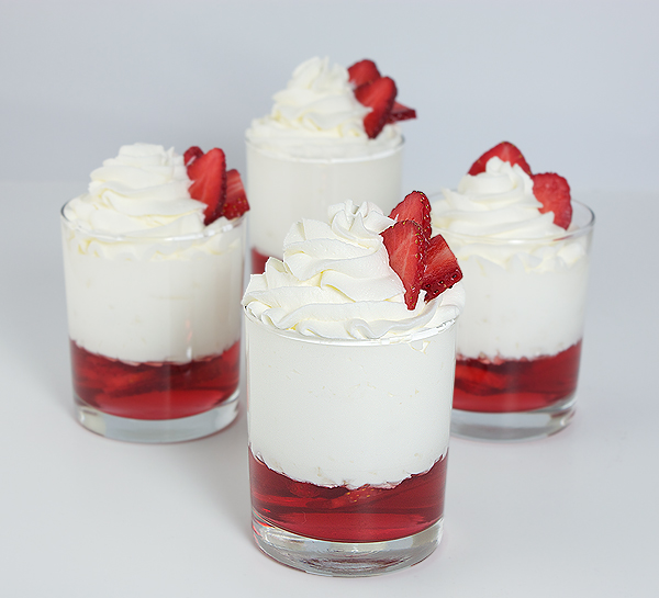 Strawberry Shortcake Trifle A photo of 4 Strawberry Shortcake Trifle desserts.