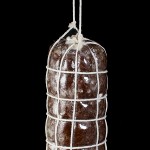 Salame al Cioccolato (Chocolate Salami) A photo of Salame al Cioccolato (Chocolate Salami) hanging and decorated to resemble Savoury Salami.