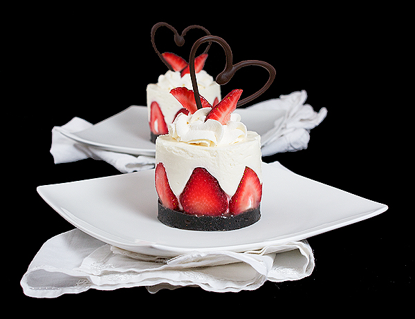 yoghurt cake, Italian desserts, recipes with yogurt A photo of cold Yoghurt Cake, garnished with freshly whipped cream, strawberries and a chocolate heart.