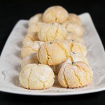 Amaretti A photo of Italian Amaretti Cookies displayed on a white rectangular dish.