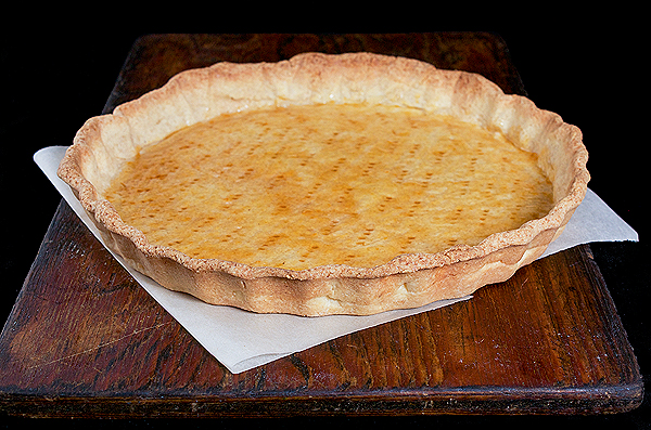 Crostata Pastry Shell glazed with Grand Marnier-Apricot Glaze A photo of a Crostata pastry shell made using Pasta Frolla coated with Grand Marnier-Apricot Glaze.