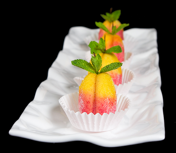 Crema Pasticcera A photo of Italian Cookies, Pesche Dolci filled with Crema Pasticcera.