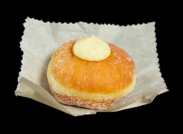 Bomboloni alla Crema - Krapfen {Italian Cream-Filled Donuts} A photo of a Bombolone, an Italian Cream Filled Donut.