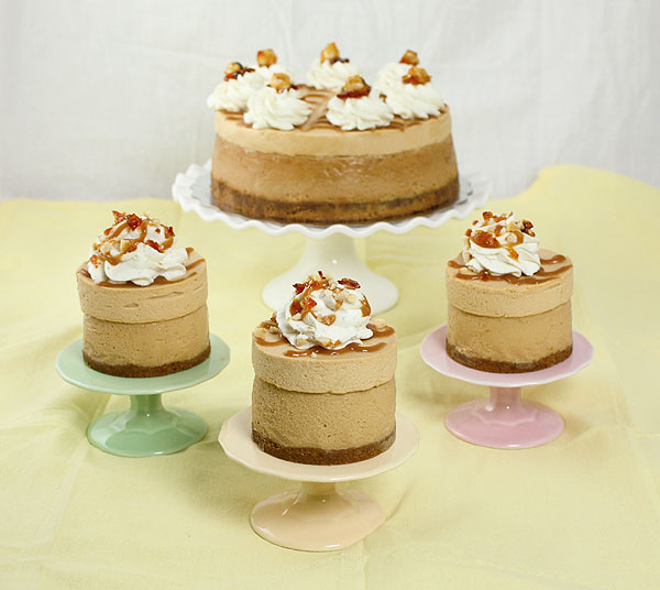 Photo of Dulce de Leche Cheesecake and Mini Cheesecakes displayed on multi coloured cupcake stands.