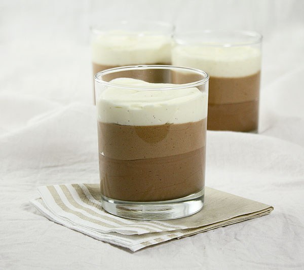 Three individual Triple Chocolate Mousse desserts in dessert glasses.