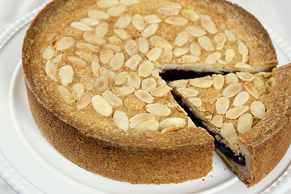 Close up photo looking down on a Blackberry and Almond Shortbread Cake.
