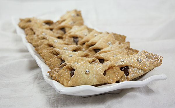 Photo of Nutella cookies displayed on white rectangle shaped serving dish.